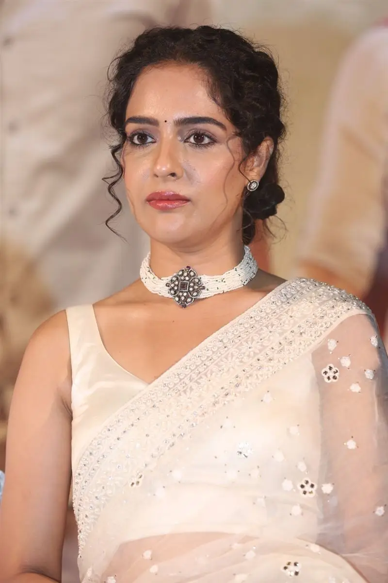 Malvi Malhotra In White Saree at Tiragabadara Saami Movie Press Meet